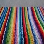 Plaid de rayures multicolores pour la mise en oeuvre de résidus de fil